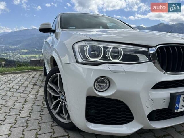Белый БМВ Х4, объемом двигателя 2 л и пробегом 163 тыс. км за 23500 $, фото 7 на Automoto.ua