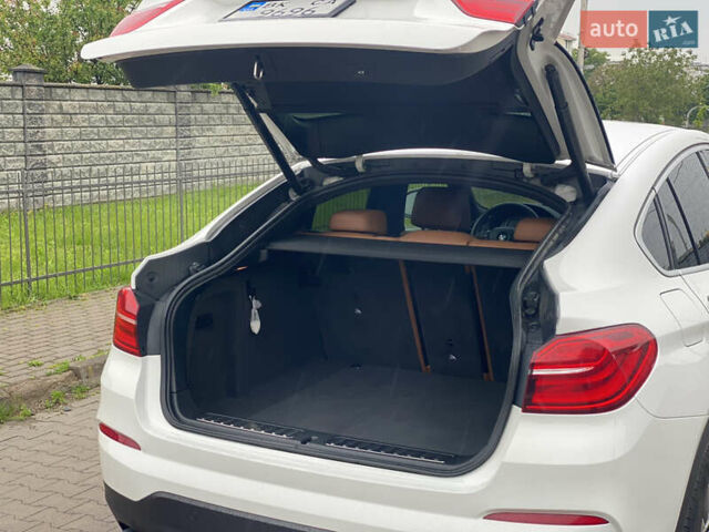 Белый БМВ Х4, объемом двигателя 2 л и пробегом 115 тыс. км за 21900 $, фото 7 на Automoto.ua