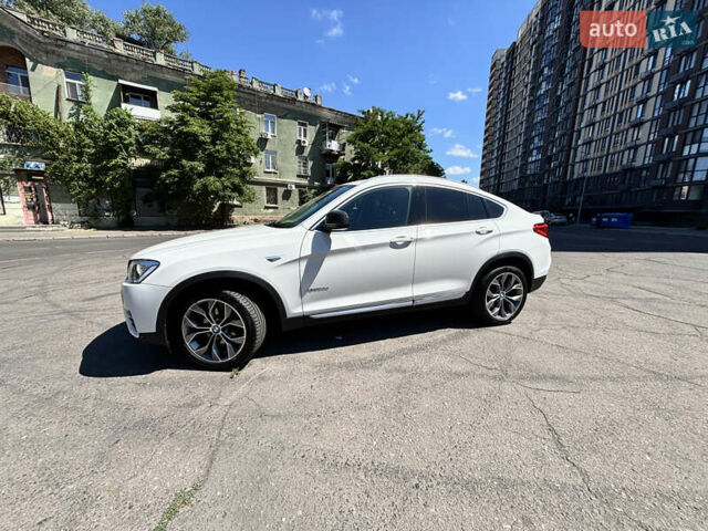 Белый БМВ Х4, объемом двигателя 2 л и пробегом 114 тыс. км за 27600 $, фото 3 на Automoto.ua