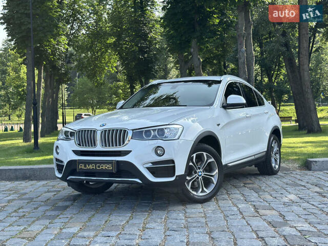 Белый БМВ Х4, объемом двигателя 2 л и пробегом 63 тыс. км за 27700 $, фото 2 на Automoto.ua