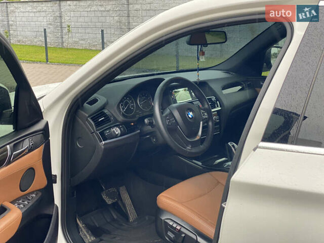Белый БМВ Х4, объемом двигателя 2 л и пробегом 115 тыс. км за 21900 $, фото 18 на Automoto.ua