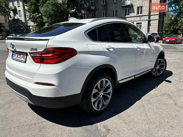 Белый БМВ Х4, объемом двигателя 2 л и пробегом 114 тыс. км за 27600 $, фото 6 на Automoto.ua