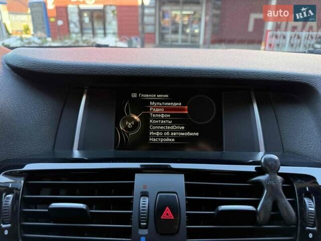 Белый БМВ Х4, объемом двигателя 2 л и пробегом 91 тыс. км за 27900 $, фото 23 на Automoto.ua