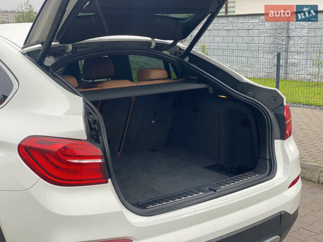 Белый БМВ Х4, объемом двигателя 2 л и пробегом 115 тыс. км за 21900 $, фото 5 на Automoto.ua