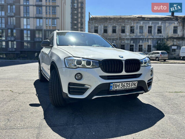 Белый БМВ Х4, объемом двигателя 2 л и пробегом 114 тыс. км за 27600 $, фото 1 на Automoto.ua