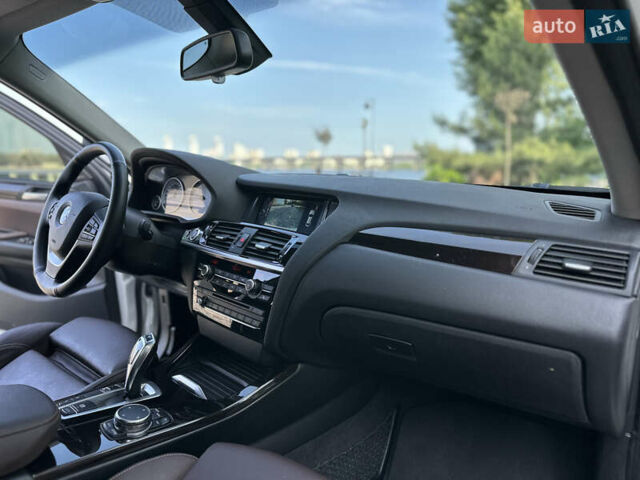 Белый БМВ Х4, объемом двигателя 2 л и пробегом 63 тыс. км за 27700 $, фото 67 на Automoto.ua