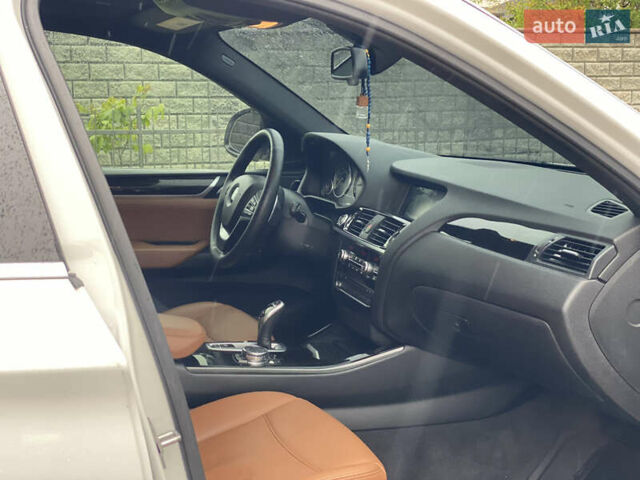 Белый БМВ Х4, объемом двигателя 2 л и пробегом 115 тыс. км за 21900 $, фото 22 на Automoto.ua