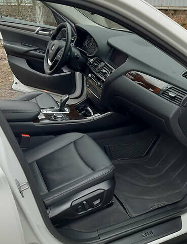 Белый БМВ Х4, объемом двигателя 2 л и пробегом 165 тыс. км за 26500 $, фото 30 на Automoto.ua