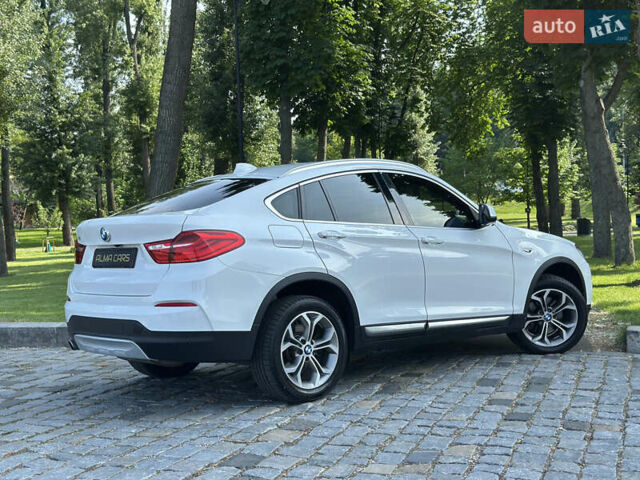 Белый БМВ Х4, объемом двигателя 2 л и пробегом 63 тыс. км за 27700 $, фото 22 на Automoto.ua
