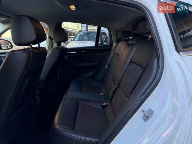 Белый БМВ Х4, объемом двигателя 2 л и пробегом 91 тыс. км за 27900 $, фото 29 на Automoto.ua