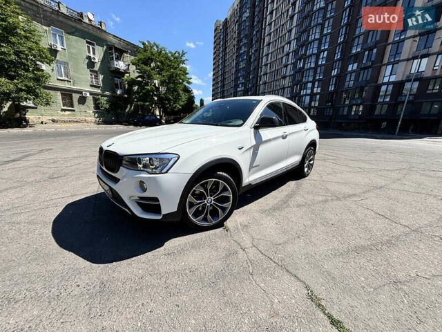Белый БМВ Х4, объемом двигателя 2 л и пробегом 114 тыс. км за 27600 $, фото 2 на Automoto.ua