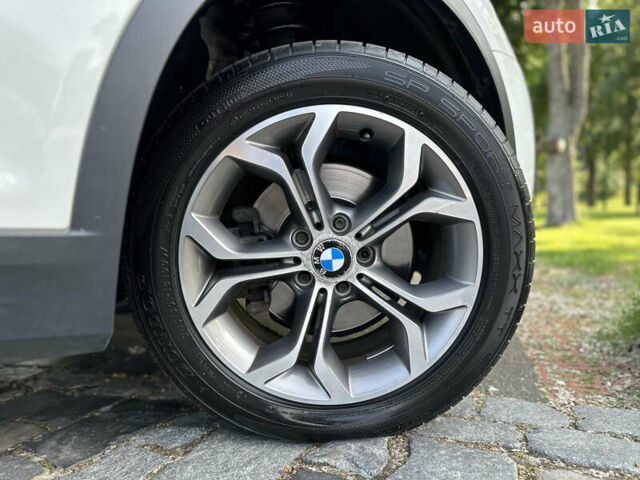 Белый БМВ Х4, объемом двигателя 2 л и пробегом 63 тыс. км за 27700 $, фото 30 на Automoto.ua