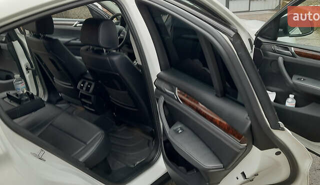 Белый БМВ Х4, объемом двигателя 2 л и пробегом 165 тыс. км за 26500 $, фото 22 на Automoto.ua