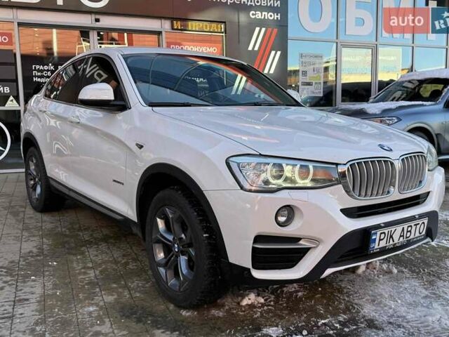 Белый БМВ Х4, объемом двигателя 2 л и пробегом 91 тыс. км за 27900 $, фото 3 на Automoto.ua