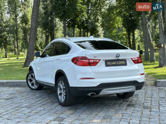Белый БМВ Х4, объемом двигателя 2 л и пробегом 63 тыс. км за 27700 $, фото 13 на Automoto.ua