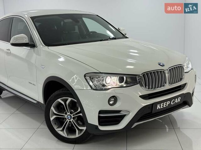Белый БМВ Х4, объемом двигателя 2 л и пробегом 166 тыс. км за 24000 $, фото 2 на Automoto.ua