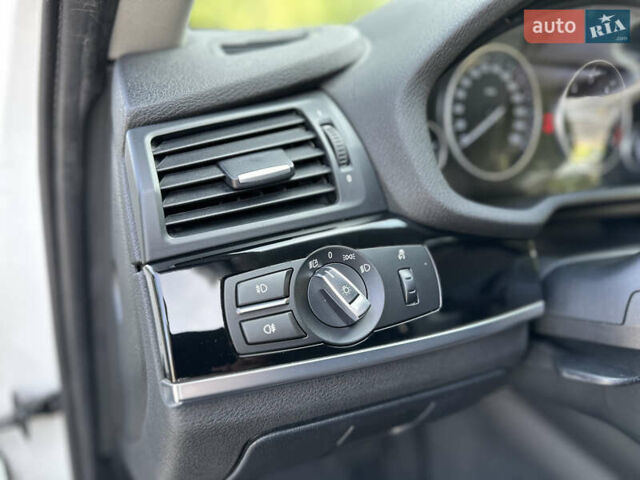 Белый БМВ Х4, объемом двигателя 2 л и пробегом 63 тыс. км за 27700 $, фото 40 на Automoto.ua