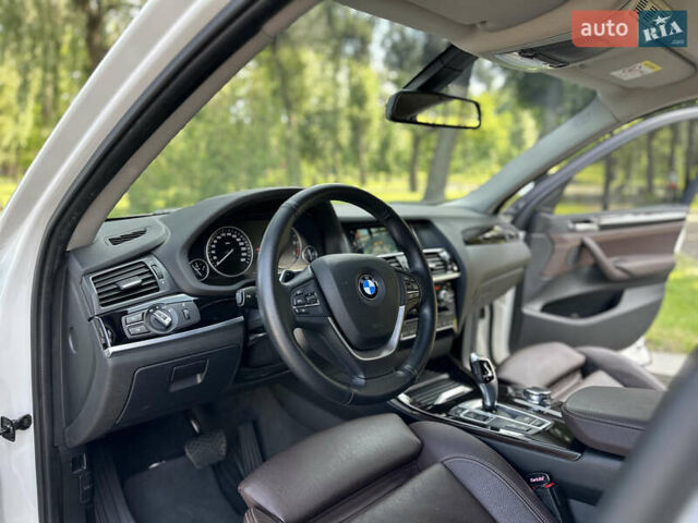 Белый БМВ Х4, объемом двигателя 2 л и пробегом 63 тыс. км за 27700 $, фото 36 на Automoto.ua
