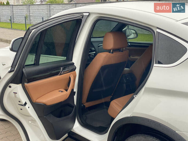 Белый БМВ Х4, объемом двигателя 2 л и пробегом 115 тыс. км за 21900 $, фото 26 на Automoto.ua