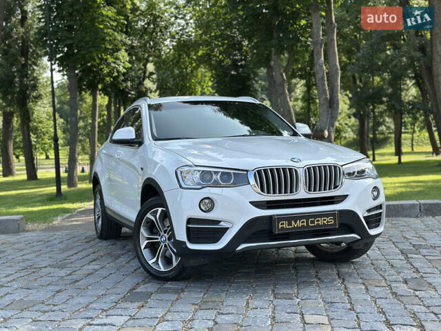 Белый БМВ Х4, объемом двигателя 2 л и пробегом 63 тыс. км за 27700 $, фото 4 на Automoto.ua