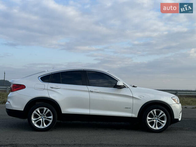 Белый БМВ Х4, объемом двигателя 2 л и пробегом 140 тыс. км за 17800 $, фото 11 на Automoto.ua