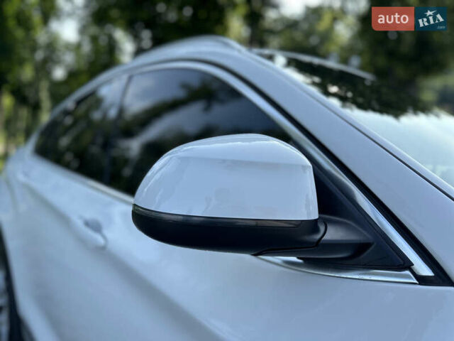 Белый БМВ Х4, объемом двигателя 2 л и пробегом 63 тыс. км за 27700 $, фото 10 на Automoto.ua