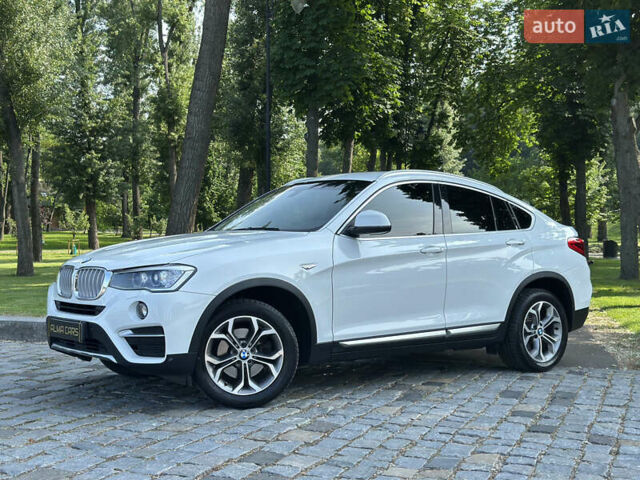 Белый БМВ Х4, объемом двигателя 2 л и пробегом 63 тыс. км за 27700 $, фото 3 на Automoto.ua