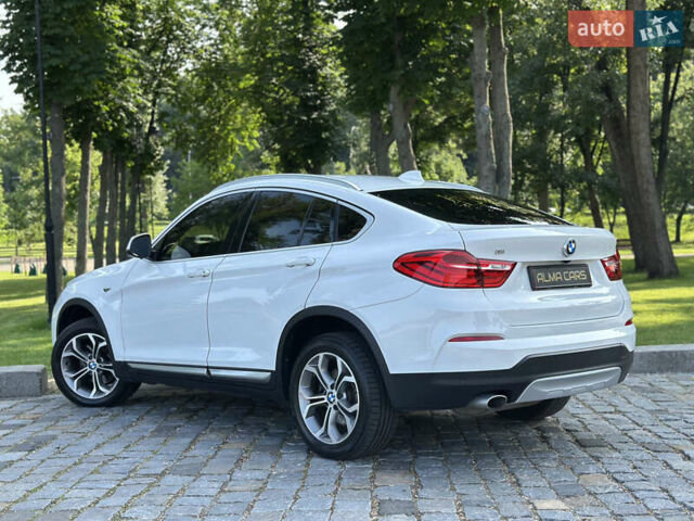 Белый БМВ Х4, объемом двигателя 2 л и пробегом 63 тыс. км за 27700 $, фото 11 на Automoto.ua