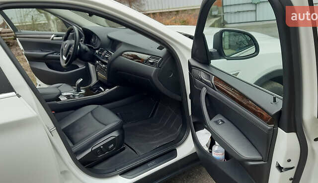 Белый БМВ Х4, объемом двигателя 2 л и пробегом 165 тыс. км за 26500 $, фото 26 на Automoto.ua