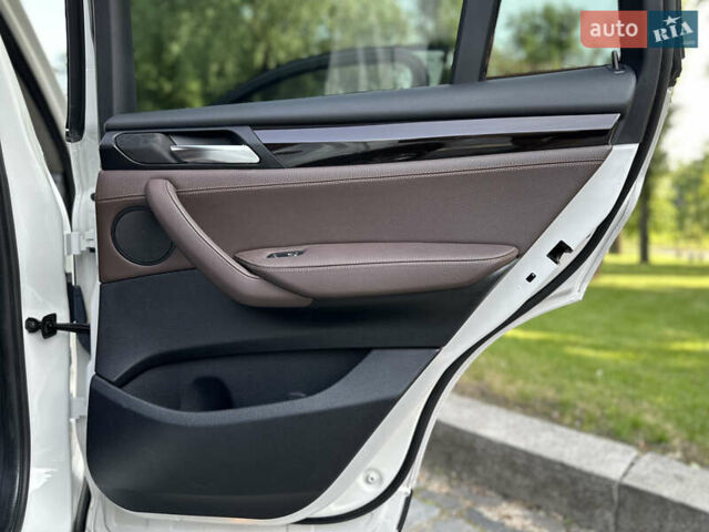 Белый БМВ Х4, объемом двигателя 2 л и пробегом 63 тыс. км за 27700 $, фото 56 на Automoto.ua