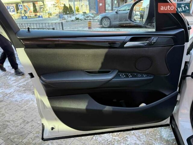 Белый БМВ Х4, объемом двигателя 2 л и пробегом 91 тыс. км за 27900 $, фото 10 на Automoto.ua
