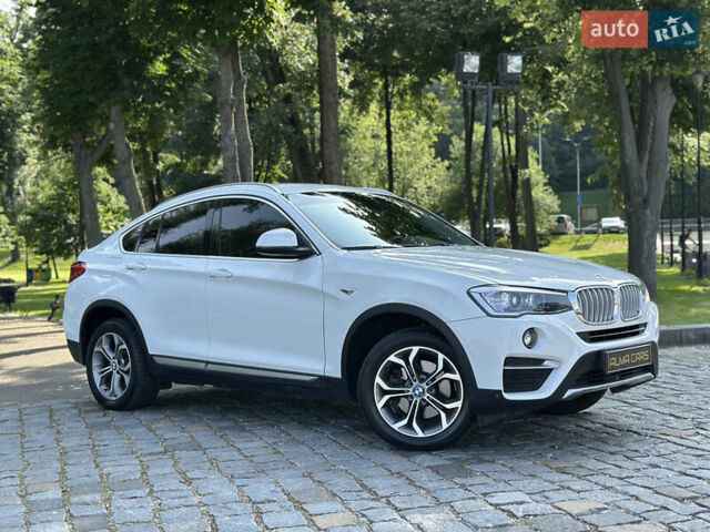 Белый БМВ Х4, объемом двигателя 2 л и пробегом 63 тыс. км за 27700 $, фото 7 на Automoto.ua