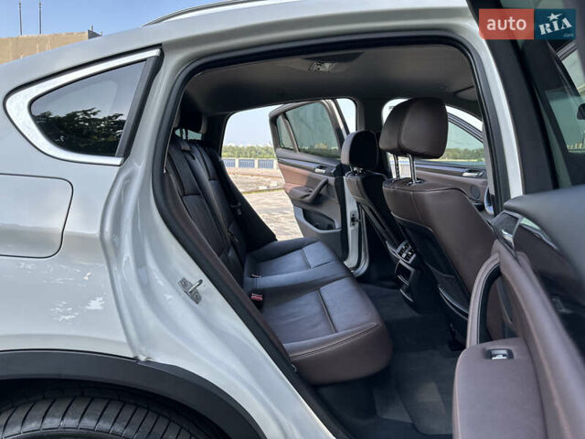 Белый БМВ Х4, объемом двигателя 2 л и пробегом 63 тыс. км за 27700 $, фото 59 на Automoto.ua