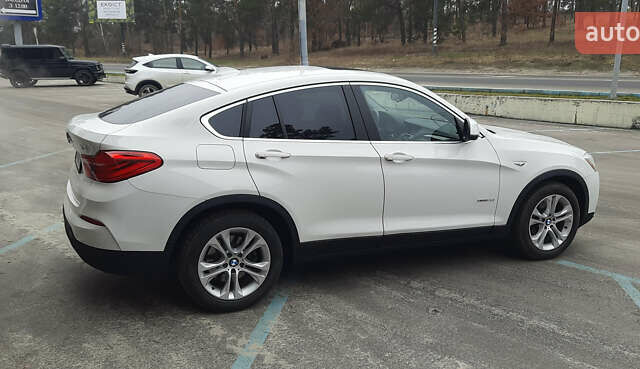 Белый БМВ Х4, объемом двигателя 2 л и пробегом 165 тыс. км за 26500 $, фото 5 на Automoto.ua