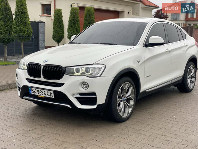 Белый БМВ Х4, объемом двигателя 2 л и пробегом 115 тыс. км за 21900 $, фото 2 на Automoto.ua