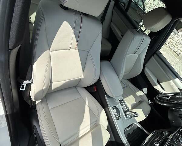 Белый БМВ Х4, объемом двигателя 2 л и пробегом 163 тыс. км за 23500 $, фото 30 на Automoto.ua