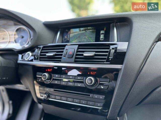 Белый БМВ Х4, объемом двигателя 2 л и пробегом 63 тыс. км за 27700 $, фото 69 на Automoto.ua