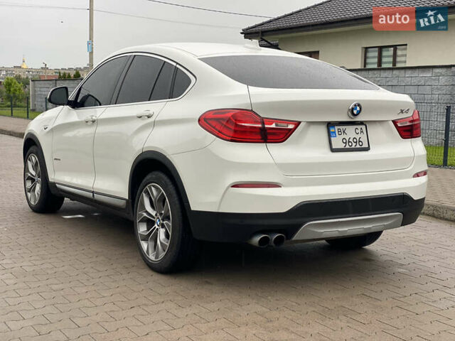 Белый БМВ Х4, объемом двигателя 2 л и пробегом 115 тыс. км за 21900 $, фото 4 на Automoto.ua