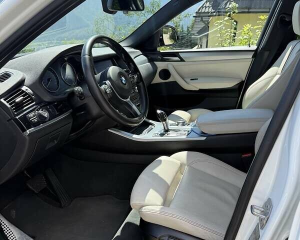 Белый БМВ Х4, объемом двигателя 2 л и пробегом 163 тыс. км за 23500 $, фото 12 на Automoto.ua