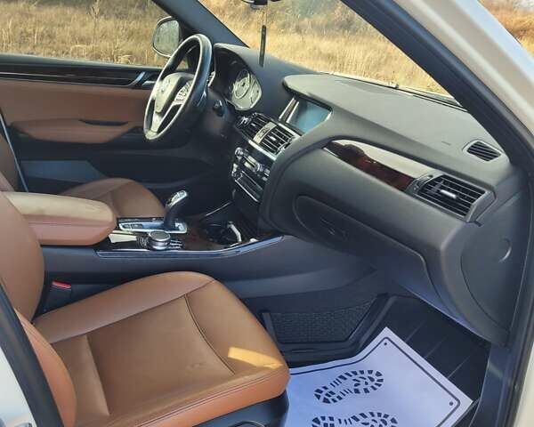 Белый БМВ Х4, объемом двигателя 2 л и пробегом 95 тыс. км за 20900 $, фото 37 на Automoto.ua