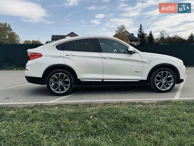 Білий БМВ Х4, об'ємом двигуна 2 л та пробігом 116 тис. км за 19900 $, фото 7 на Automoto.ua