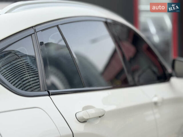 Белый БМВ Х4, объемом двигателя 2 л и пробегом 106 тыс. км за 28500 $, фото 17 на Automoto.ua