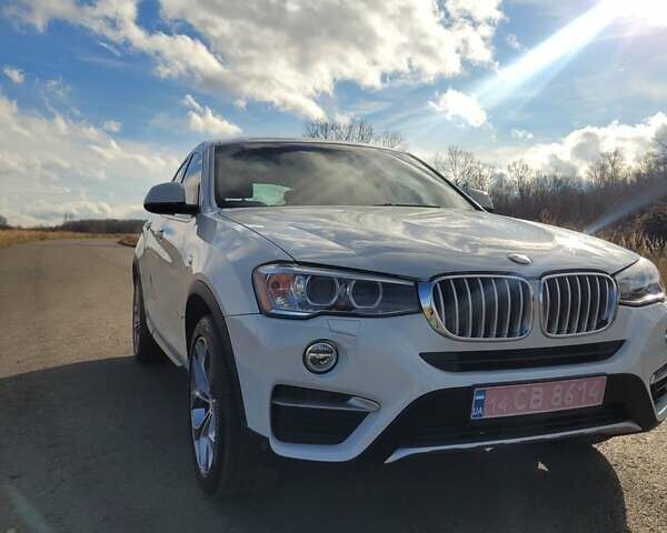 Белый БМВ Х4, объемом двигателя 2 л и пробегом 95 тыс. км за 20900 $, фото 1 на Automoto.ua