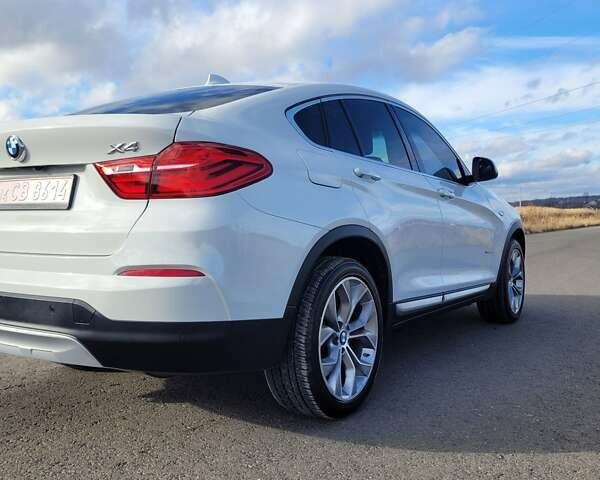 Белый БМВ Х4, объемом двигателя 2 л и пробегом 95 тыс. км за 20900 $, фото 8 на Automoto.ua