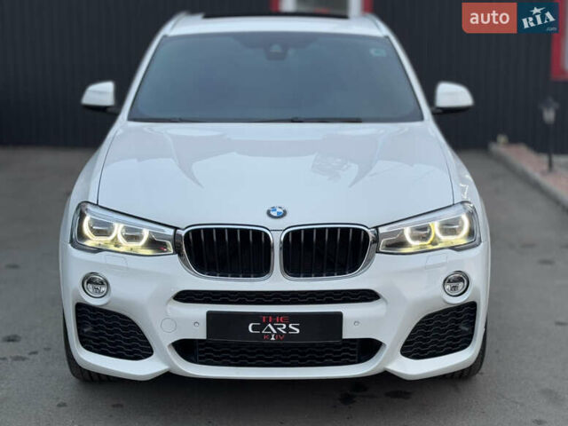 Белый БМВ Х4, объемом двигателя 2 л и пробегом 106 тыс. км за 28500 $, фото 3 на Automoto.ua