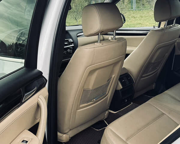 Білий БМВ Х4, об'ємом двигуна 2 л та пробігом 116 тис. км за 19900 $, фото 13 на Automoto.ua