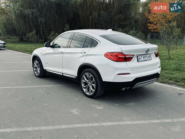 Білий БМВ Х4, об'ємом двигуна 2 л та пробігом 116 тис. км за 19900 $, фото 4 на Automoto.ua