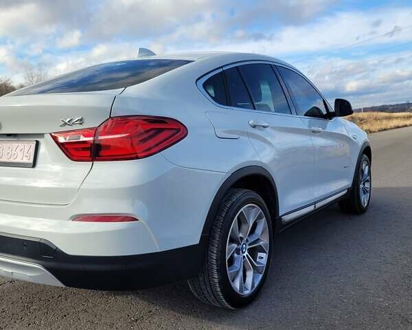 Белый БМВ Х4, объемом двигателя 2 л и пробегом 95 тыс. км за 20900 $, фото 10 на Automoto.ua