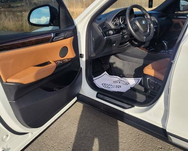 Белый БМВ Х4, объемом двигателя 2 л и пробегом 95 тыс. км за 20900 $, фото 32 на Automoto.ua