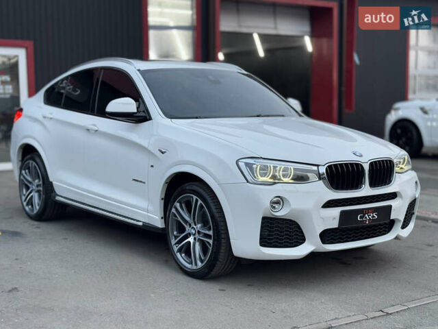 Белый БМВ Х4, объемом двигателя 2 л и пробегом 106 тыс. км за 28500 $, фото 4 на Automoto.ua